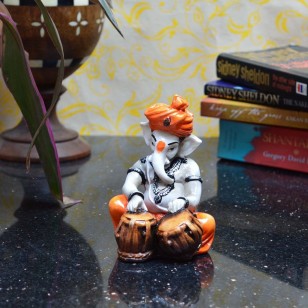 Lord Ganesha playing Tabla
